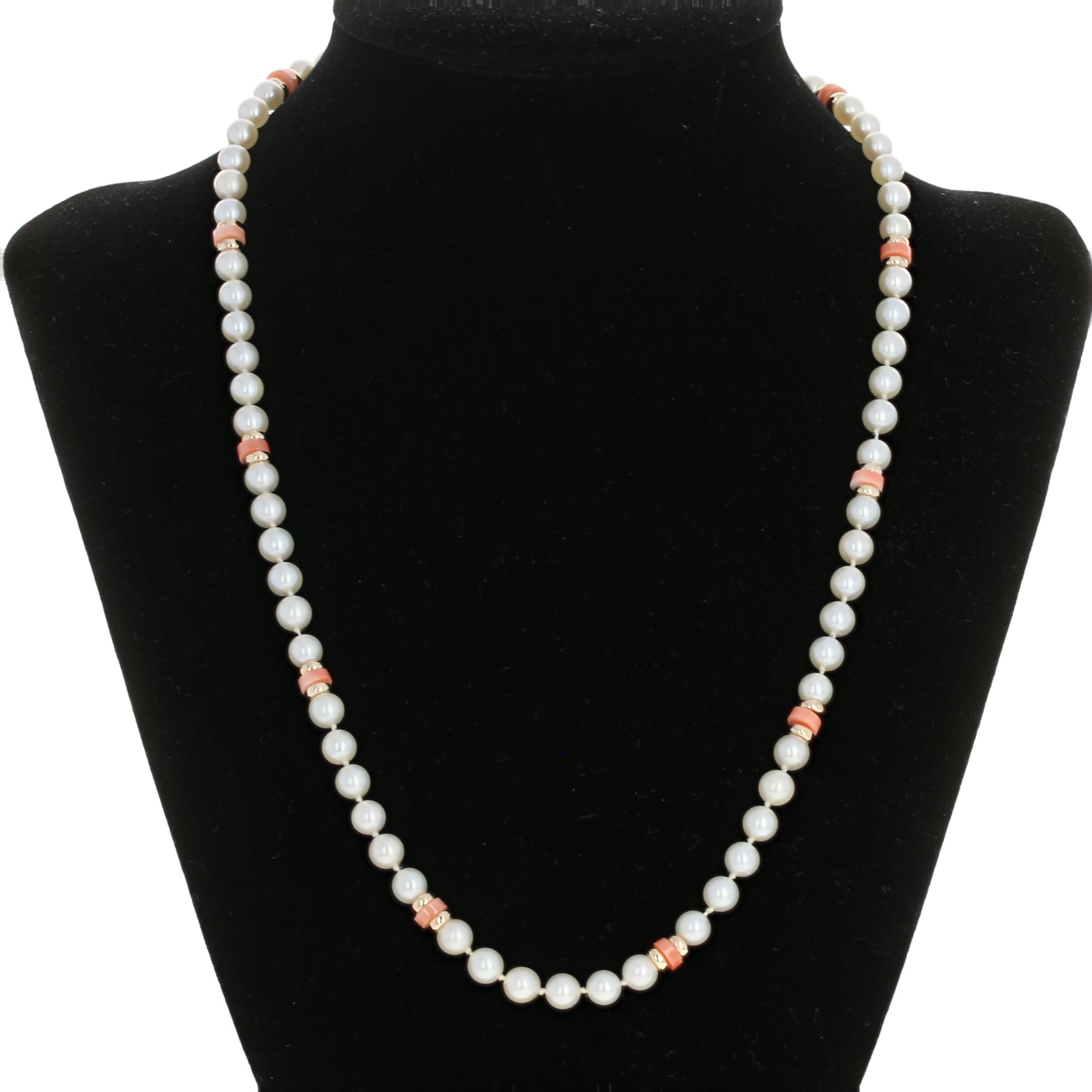 Metal Content: Guaranteed 14k Gold as stamped

Stone Information: 
Freshwater Pearls 
Genuine Coral 

Necklace Style: Knotted Strand 
Measurements: length 18 1/2