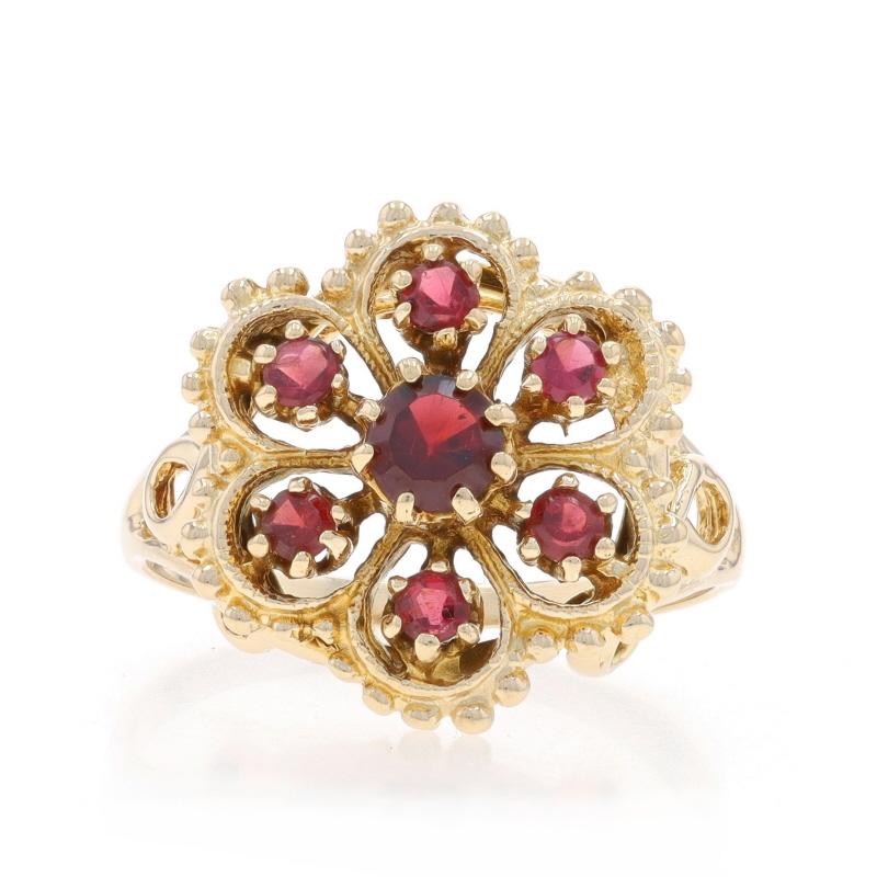 Size: 7 1/2
Sizing Fee: Up 2 1/2 sizes for $35 or Down 1 1/2 sizes for $30

Metal Content: 14k Yellow Gold

Stone Information

Natural Garnets
Carat(s): .60ctw
Cut: Round
Color: Red & Purplish Red

Total Carats: .60ctw

Style: Cluster