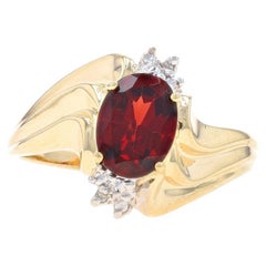 Yellow Gold Garnet & Diamond Bypass Ring - 10k Oval 1.40ct