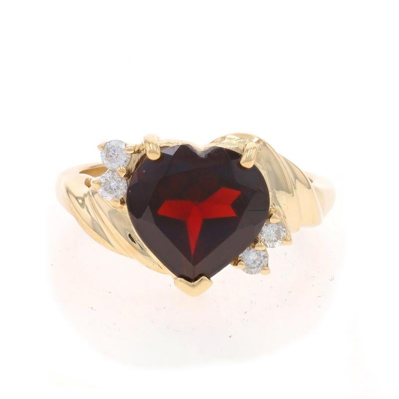 Size: 6 1/4
Sizing Fee: Up 3 sizes for $35 or Down 1 1/2 sizes for $35

Metal Content: 14k Yellow Gold

Stone Information

Natural Garnet
Carat(s): 3.02ct
Cut: Heart
Color: Red

Natural Diamonds
Carat(s): .16ctw
Cut: Round Brilliant
Color: G -