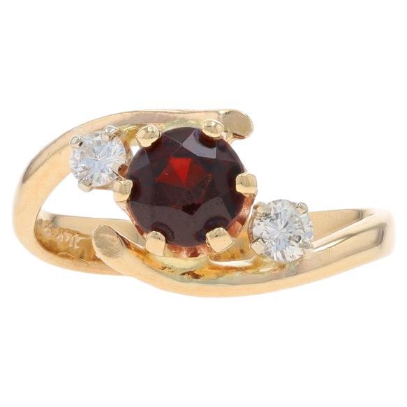 Bypass-Ring aus Gelbgold mit Granat und Diamant - 14k rund 1,20 ctw