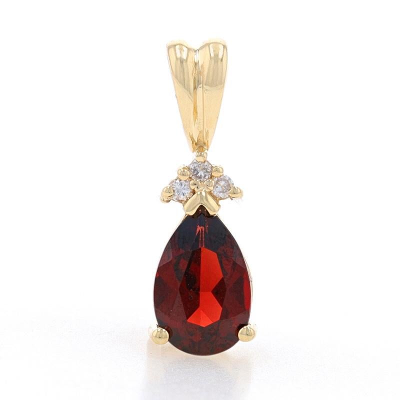Metal Content: 14k Yellow Gold

Stone Information

Natural Garnet
Carat(s): 1.20ct
Cut: Pear
Color: Red

Natural Diamonds
Carat(s): .03ctw
Cut: Round Brilliant
Color: H - I
Clarity: SI1 - SI2

Total Carats: 1.23ctw

Measurements

Tall (from