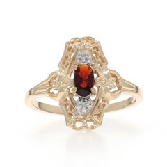 Yellow Gold Garnet Diamond Ring - 10k Oval .23ctw