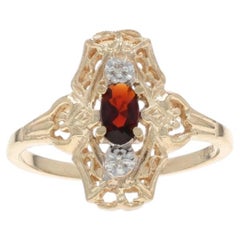 Yellow Gold Garnet Diamond Ring - 10k Oval .23ctw