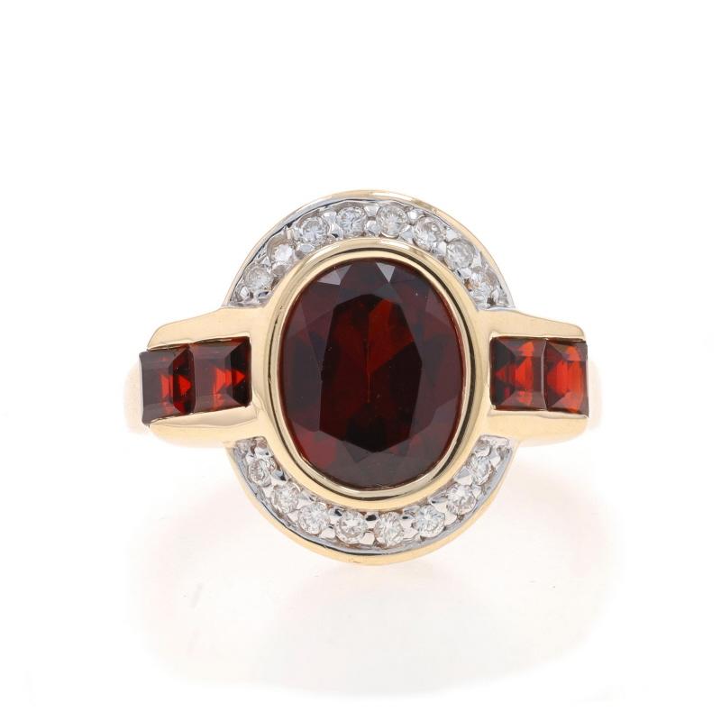Size: 8
Sizing Fee: Up 1/2 a size for $35 or Down 1/2 a size for $35

Metal Content: 14k Yellow Gold & 14k White Gold

Stone Information

Natural Garnets
Carat(s): 3.48ctw
Cut: Oval & Square
Color: Red

Natural Diamonds
Carat(s): .16ctw
Cut: Round