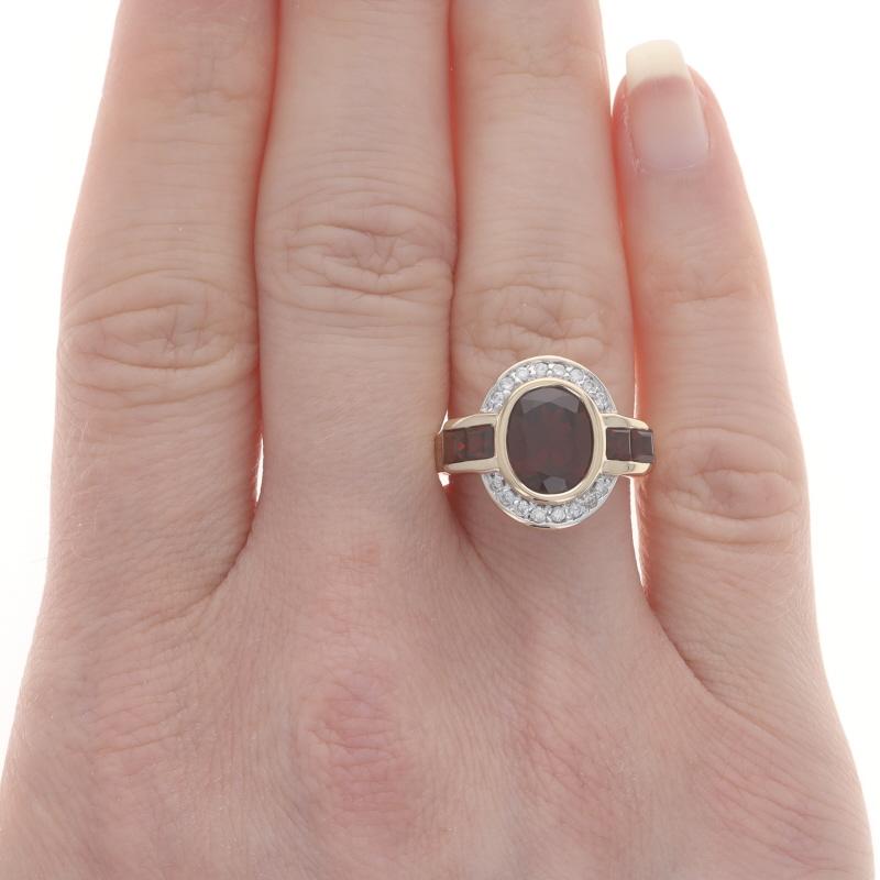 Oval Cut Yellow Gold Garnet Diamond Ring - 14k Oval & Square 3.64ctw Halo-Inspired For Sale