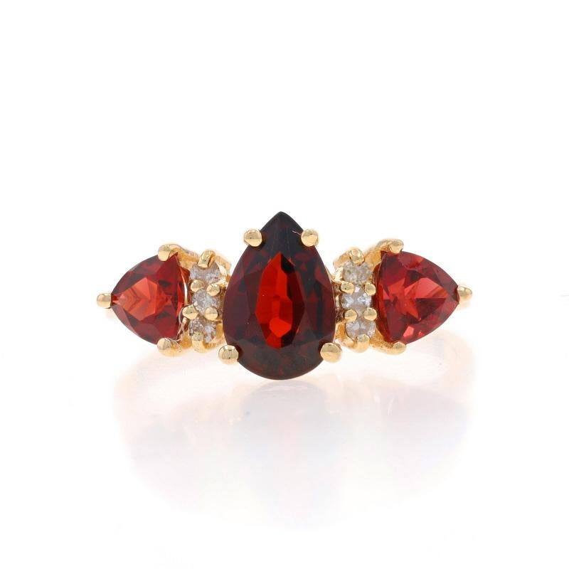 Size: 8 1/4
Sizing Fee: Up 2 sizes for $35 or Down 1 1/2 sizes for $35

Metal Content: 14k Yellow Gold

Stone Information

Natural Garnets
Carat(s): 2.14ctw
Cut: Pear & Trillion
Color: Red

Natural Diamonds
Carat(s): .09ctw
Cut: Round