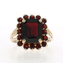Anello aureola con granato in oro giallo - 10k Smeraldo 9,46ctw