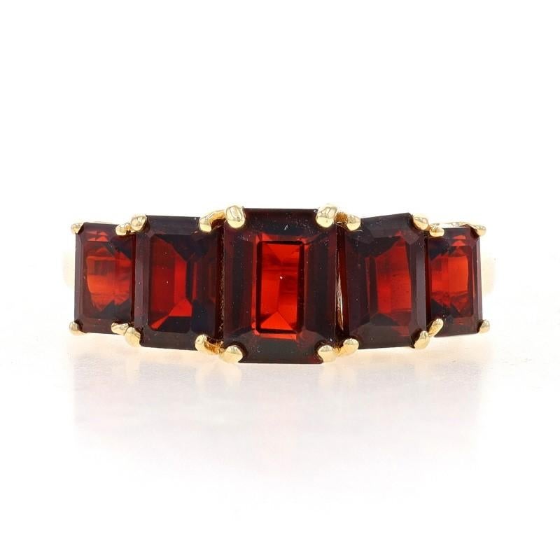 Size: 7
Sizing Fee: Up 2 sizes for $35 or Down 1 size for $30

Metal Content: 10k Yellow Gold

Stone Information
Natural Garnets
Carat(s): 3.25ctw
Cut: Emerald
Color: Red

Total Carats: 3.25ctw

Style: Graduated Five-Stone
Features: Tiered