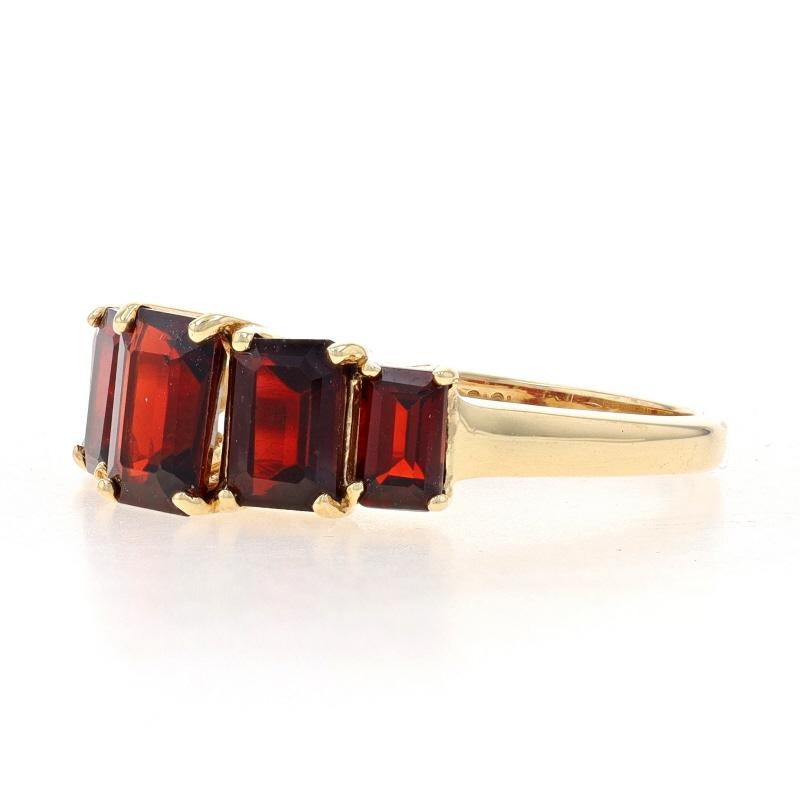 Yellow Gold Garnet Graduated Five-Stone Ring - 10k Emerald Cut 3.25ctw In Good Condition For Sale In Greensboro, NC