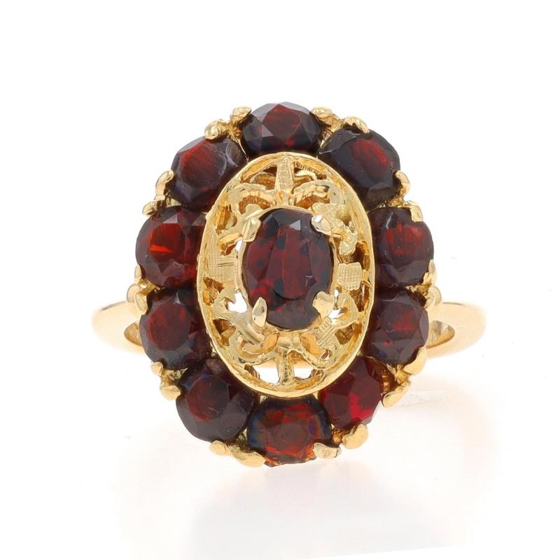 Size: 5 1/2
Sizing Fee: Up 3 sizes for $35 or Down 1 1/2 sizes for $35

Metal Content: 18k Yellow Gold

Stone Information

Natural Garnets
Carat(s): 3.38ctw
Cut: Oval & Round
Color: Red

Total Carats: 3.38ctw

Style: Solitaire with Accents Halo