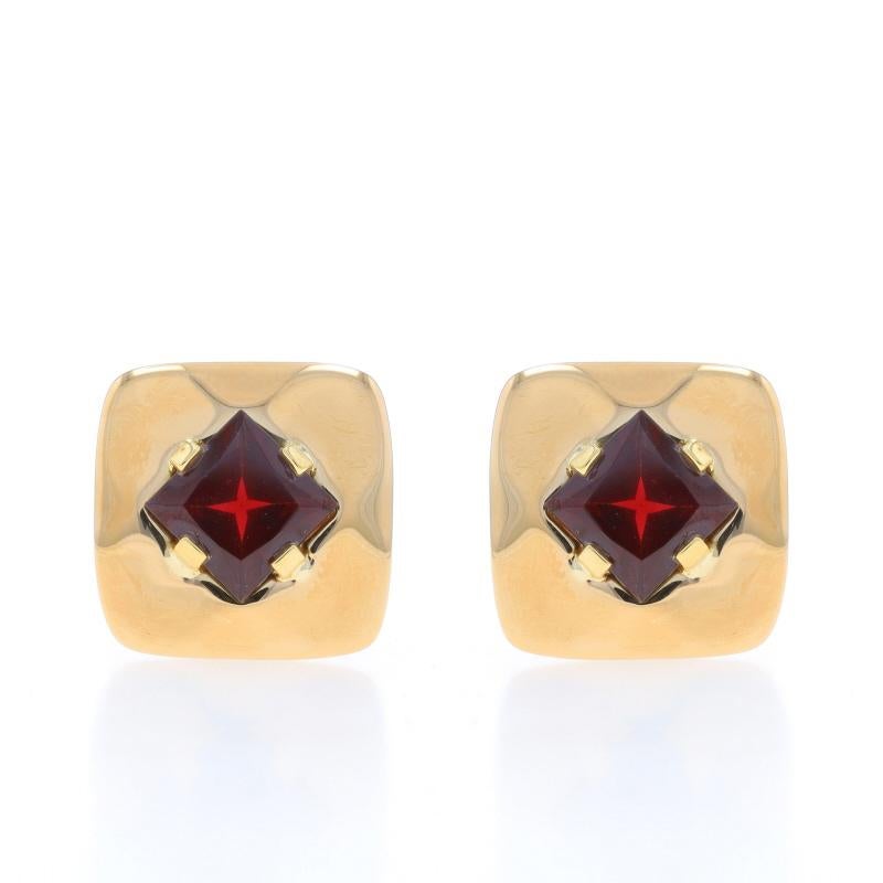 Metal Content: 18k Yellow Gold

Stone Information

Natural Garnets
Carat(s): 5.12ctw
Cut: Modified Square
Color: Red

Total Carats: 5.12ctw

Style: Large Stud
Fastening Type: Clip-On Closures
Theme: Square
Features: Hollow