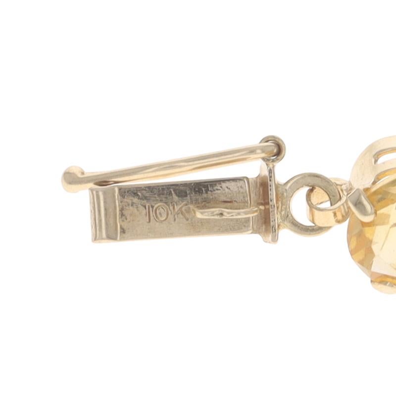 Bracelet de tennis en or jaune grenat péridot améthyste 8 1/4