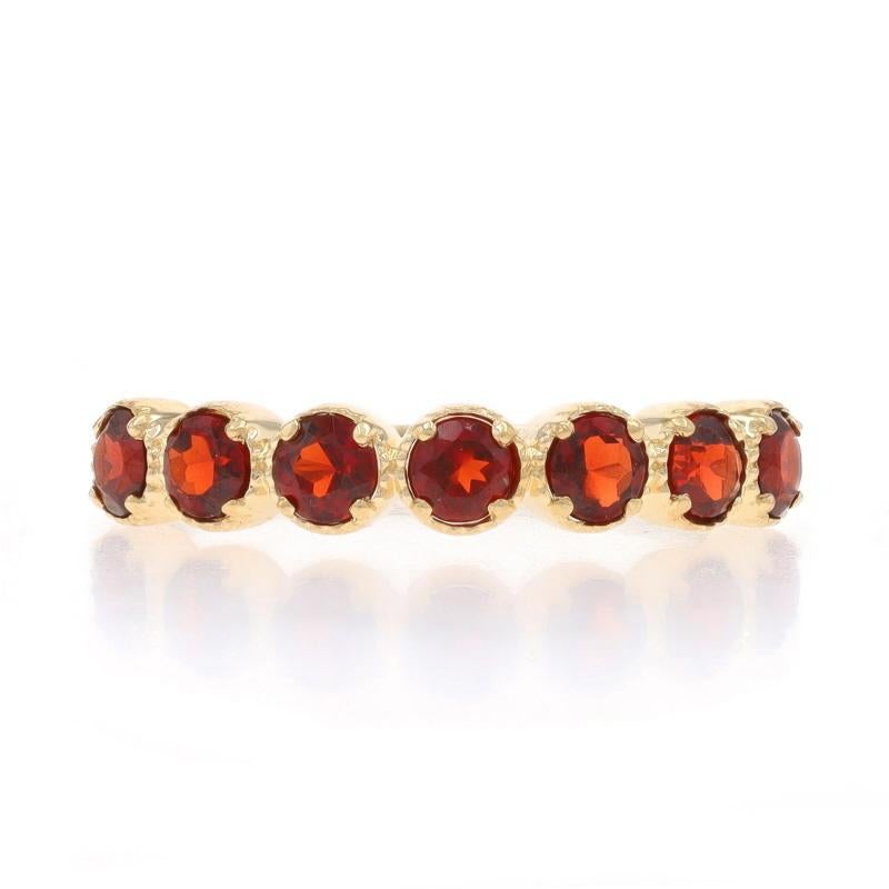Size: 6 3/4

Note: Please contact us for a resizing quote.

Metal Content: 14k Yellow Gold

Stone Information

Natural Garnets
Carat(s): .70ctw
Cut: Round
Color: Red

Total Carats: .70ctw

Style: Seven-Stone Band
Theme: Quatrefoil
Features: Milgrain