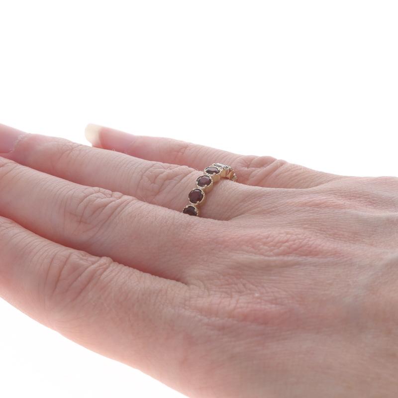 Women's Yellow Gold Garnet Seven-Stone Band - 14k Round .70ctw Quatrefoil Ring For Sale