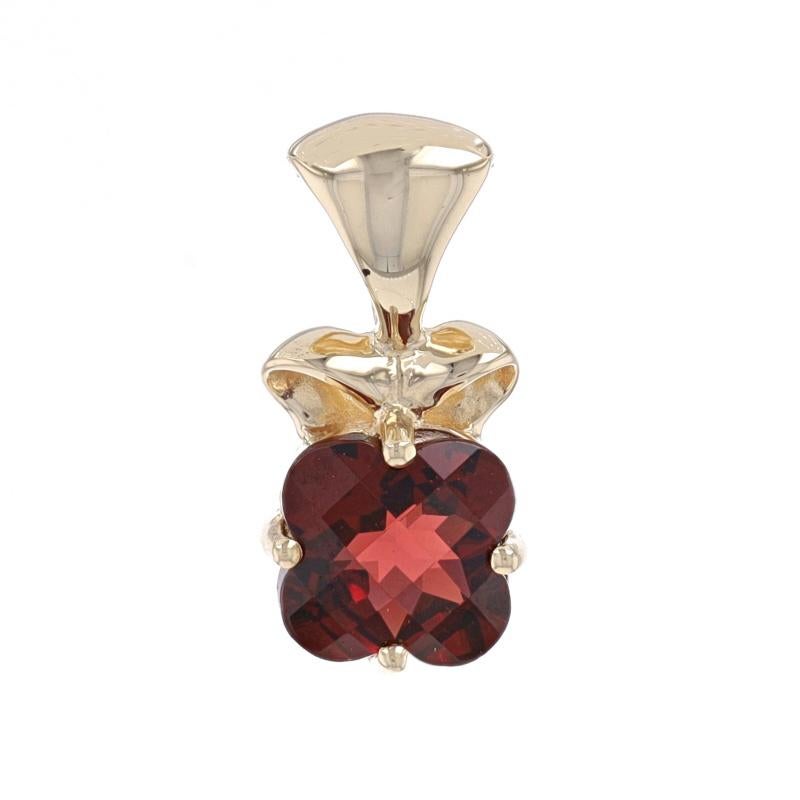 Metal Content: 14k Yellow Gold

Stone Information
Natural Garnet
Carat(s): 1.60ct
Cut: Quatrefoil Checkerboard
Color: Red

Total Carats: 1.60ct

Style: Solitaire
Theme: Flower

Measurements
Tall (from stationary bail): 11/16