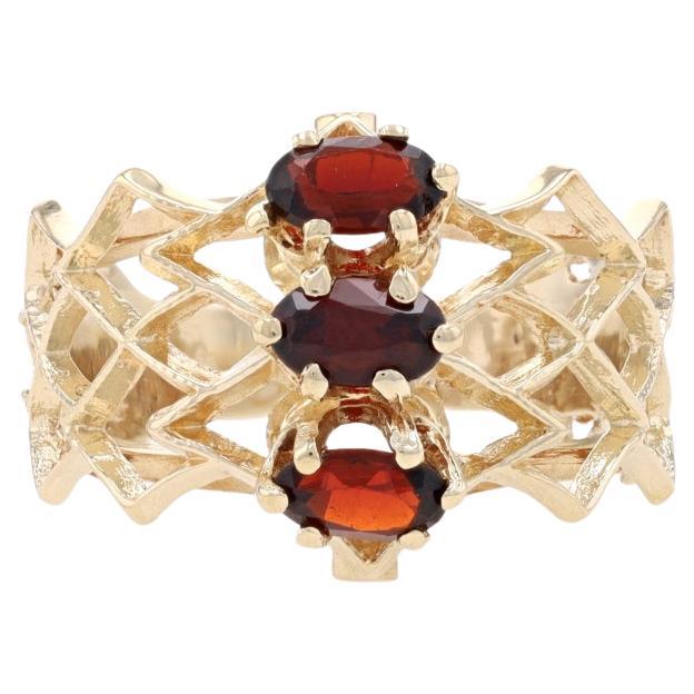 Yellow Gold Garnet Three-Stone Ring - 14k Oval .75ctw For Sale