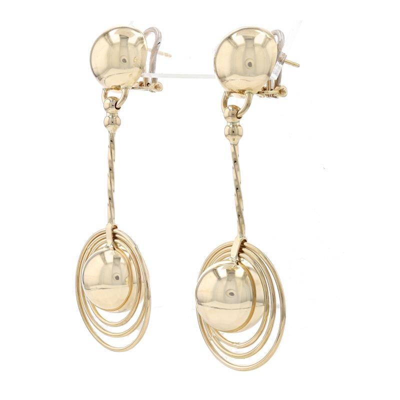 Metal Content: 14k Yellow Gold

Style: Dangle
Fastening Type: Omega Closures
Theme: Geometric Circles

Measurements

Tall: 2 5/8