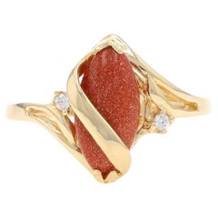Bypass-Ring aus Gelbgold mit Goldstein und kubischem Zirkon aus Gelbgold - 14k Marquise-Cabochon