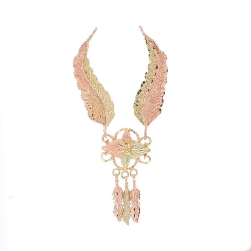 Brand: Gold Diggers

Metal Content: 10k Yellow Gold, 10k Rose Gold, & 10k Green Gold

Style: Dangle
Theme: Grape Leaves & Feathers
Features: Etched Detailing

Measurements
Tall (from stationary bails): 2 25/32