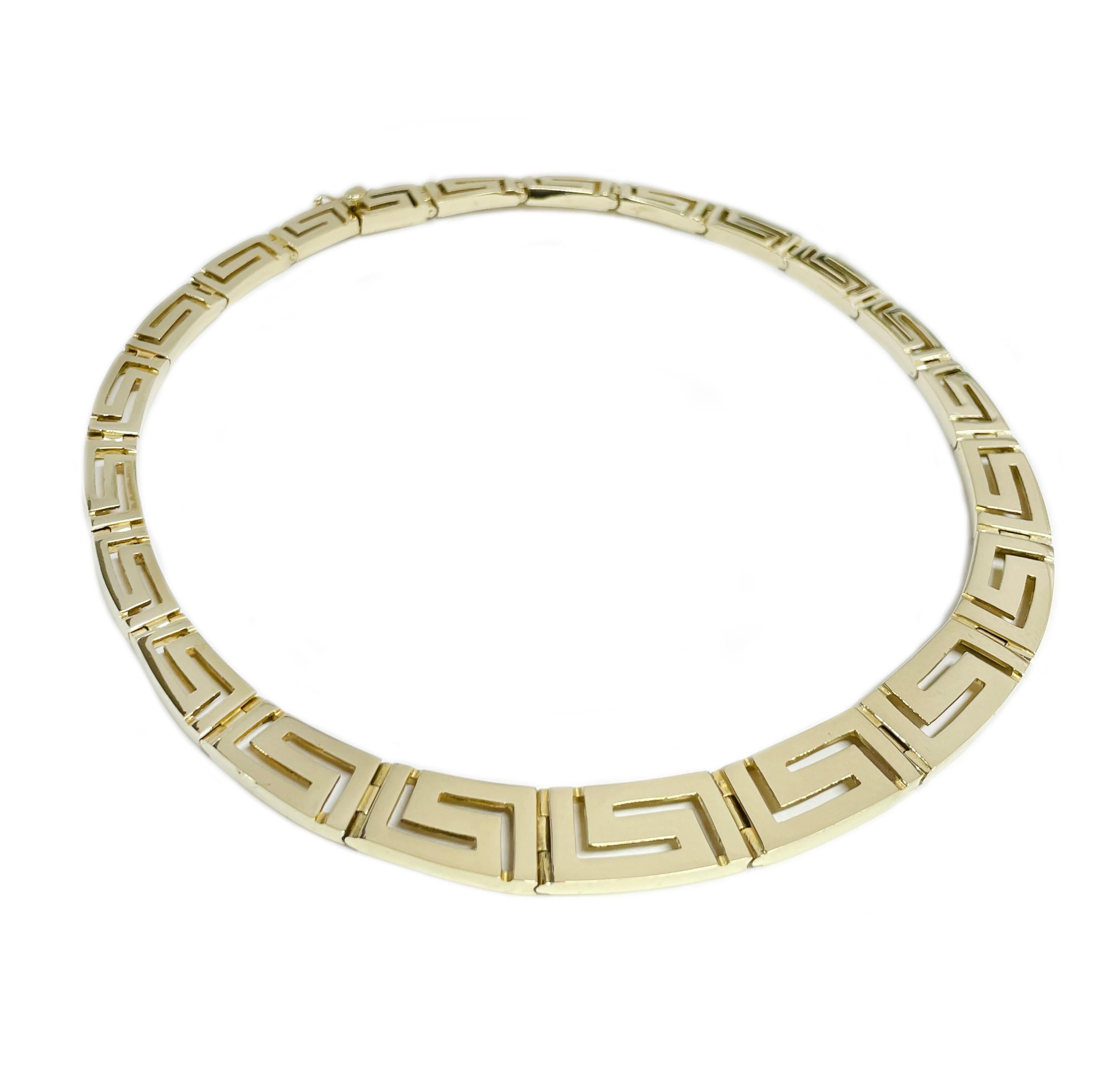 14 Karat Gold Greek Key Eternity Choker Necklace. The necklace consists of graduate rectangular gold Greek key links. The links range from 12mm x 20mm to 7mm x 14mm. The necklace has a box clasp closure with a safety eight. Stamped on the back of