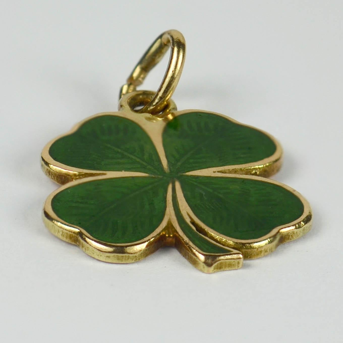 A 14 karat yellow gold charm pendant designed as a lucky four-leaf clover or shamrock with green baisse-taille enamel.
Marked 14K with makers mark for Richardson MFG Co.

Dimensions: 1.6 x 1.2 x 0.1 cm
Weight: 1.13 grams