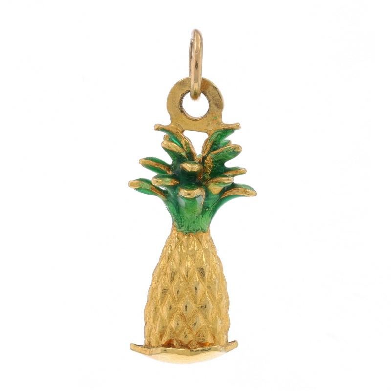 Metal Content: 18k Yellow Gold

Material Information
Enamel
Color: Green

Theme: Pineapple, Tropical Fruit
Features: Etched Detailing

Measurements
Tall (from stationary bail): 27/32