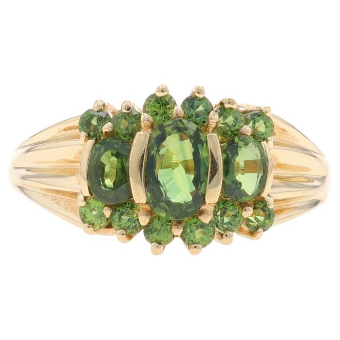 Yellow Gold Green Sapphire Ring - 10k Oval & Round 1.56ctw Three-Stone For Sale