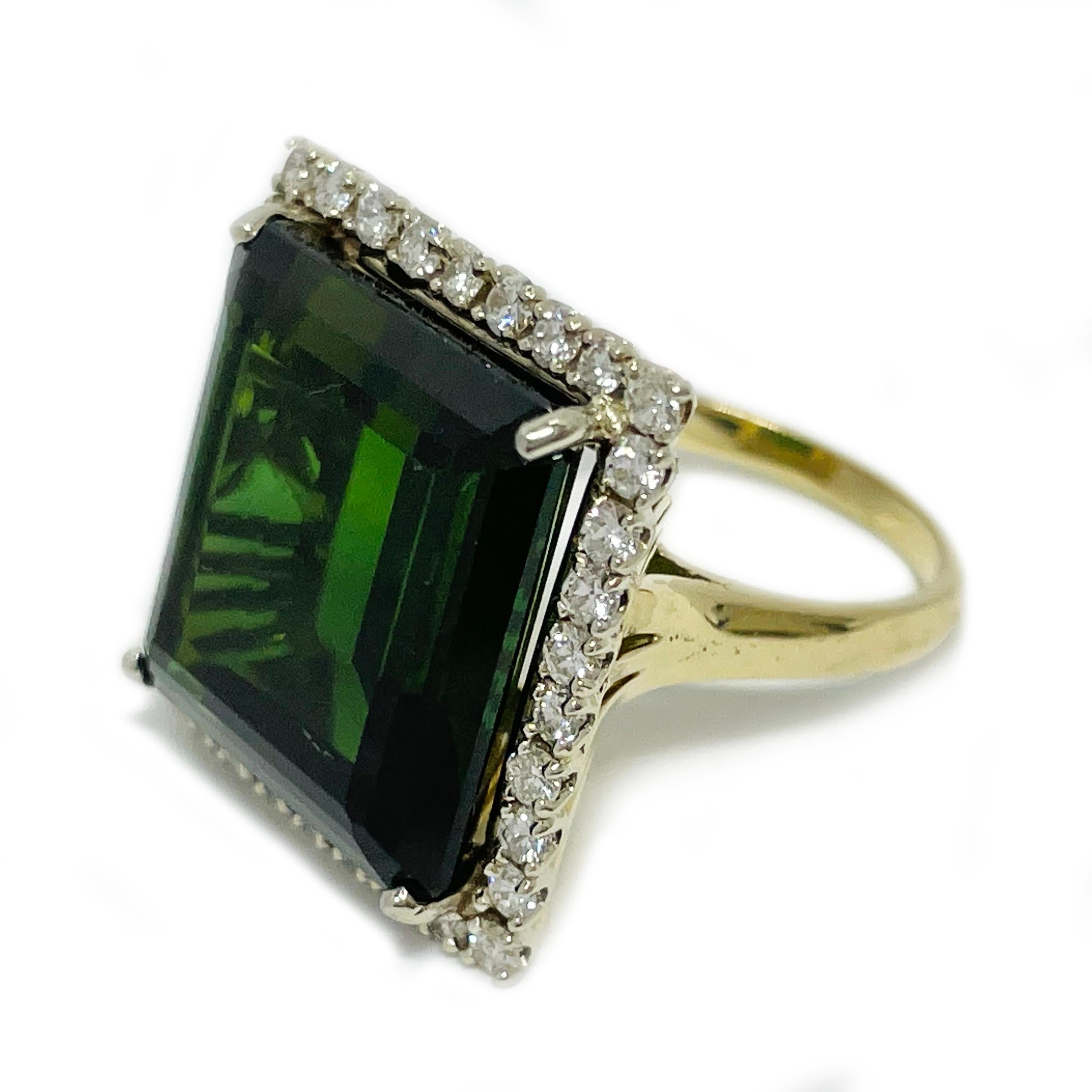 Tested 14 Karat Yellow Gold Green Tourmaline Diamond ring. The large cocktail ring features a 17 x 16.7 x 9.01mm step-cut Tourmaline with a halo of thirty-four round brilliant-cut 2mm diamonds. The medium to dark green tourmaline has a total carat
