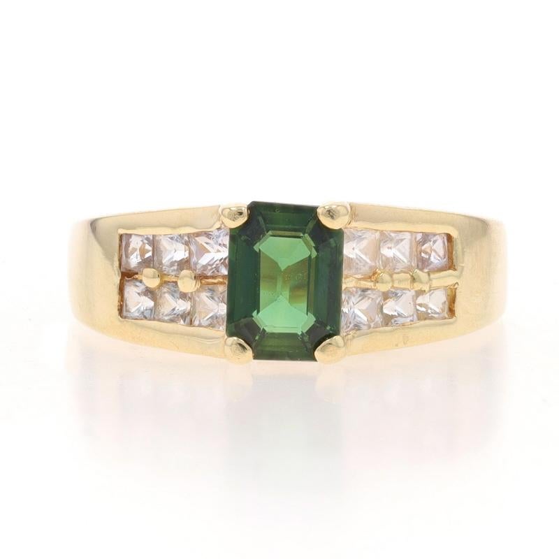 Size: 7
Sizing Fee: Up 1 size for $30 or Down 1 size for $30

Metal Content: 10k Yellow Gold

Stone Information

Natural Sapphire
Treatment: Heating
Carat(s): .96ct
Cut: Emerald
Color: Green

Natural Sapphires
Treatment: Heating
Carat(s):