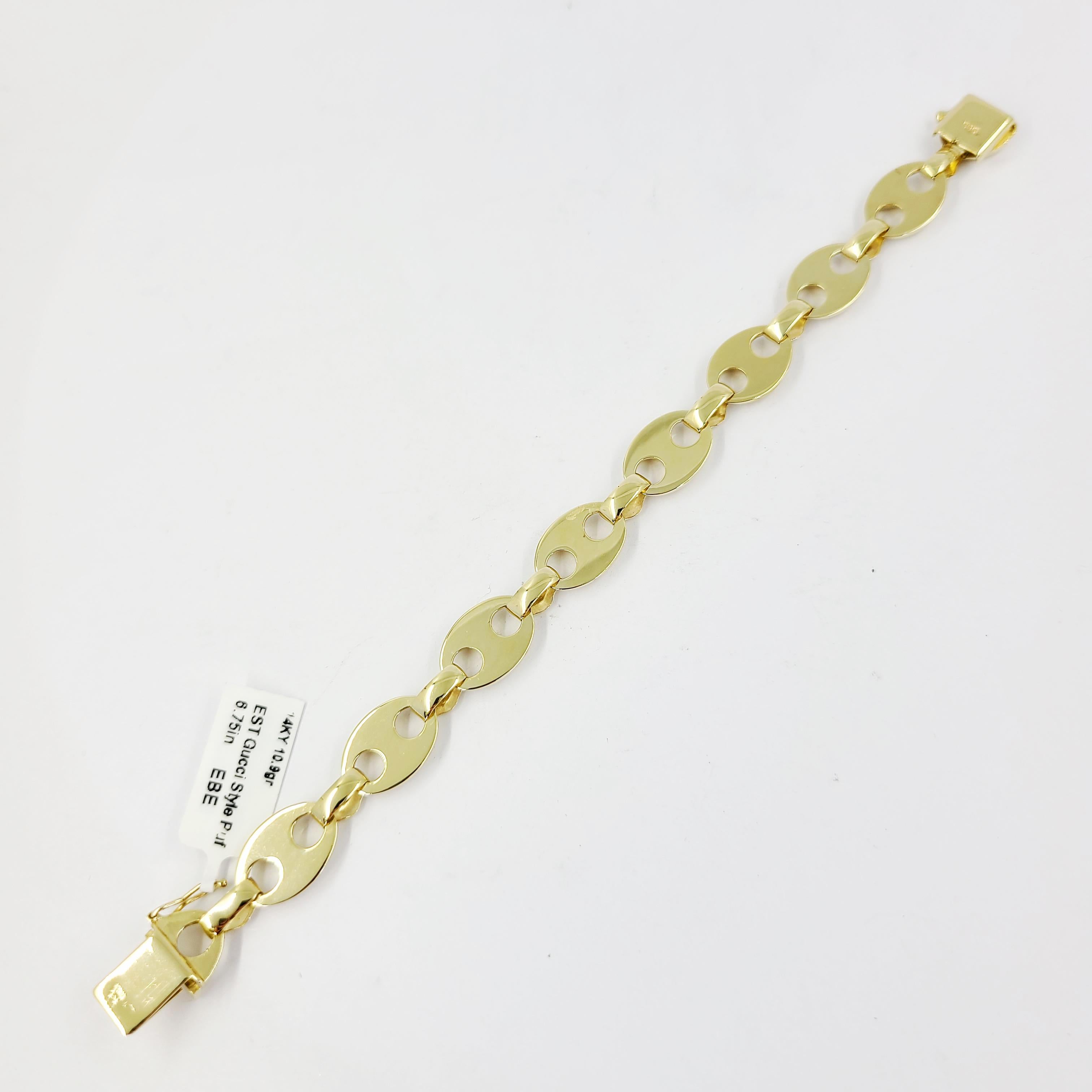 14 Karat Yellow Gold Gucci Style Puff Link Bracelet With Hidden Box Clasp. 6.75 Inches Long. Finished Weight 10.9 Grams.