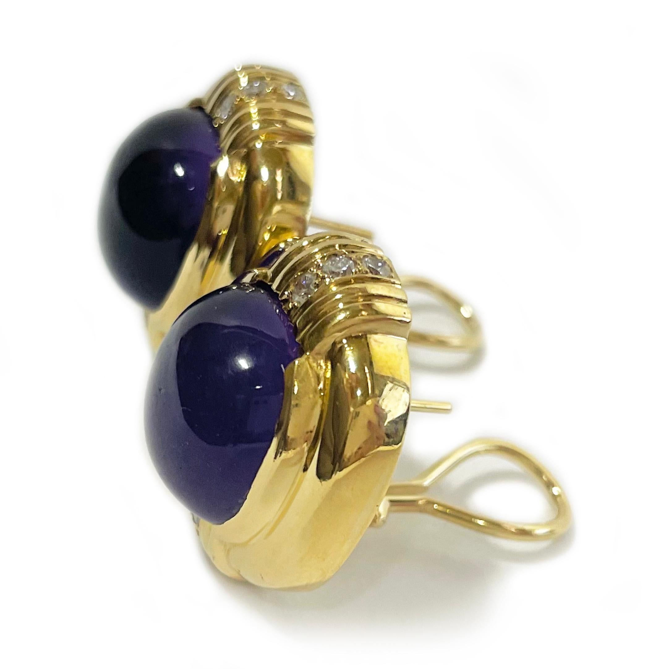 Yellow Gold Gump's Amethyst Cabochon and Diamond Earrings

These stunning earrings showcase an oval bezel-set amethyst cabochon at their center, surrounded by a wide gold bezel adorned with 12 round diamonds totaling 0.60 carats. The combination of