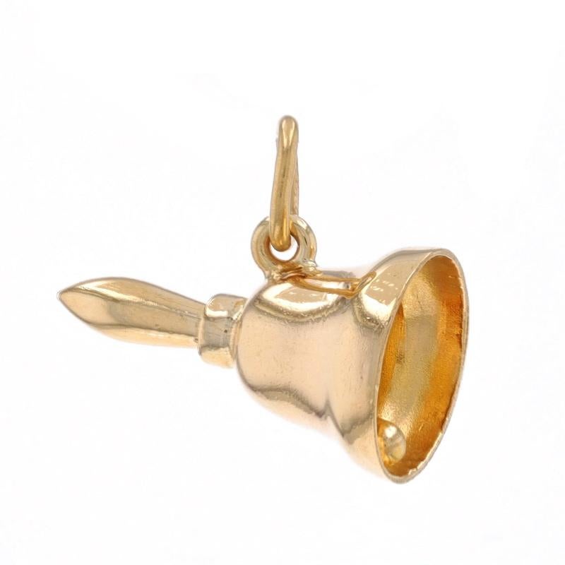 Metal Content: 14k Yellow Gold

Theme: Handbell, Musical Instrument
Features: When moved, the bell's clapper produces a light ringing sound.

Measurements
Tall (from stationary bail): 13/32