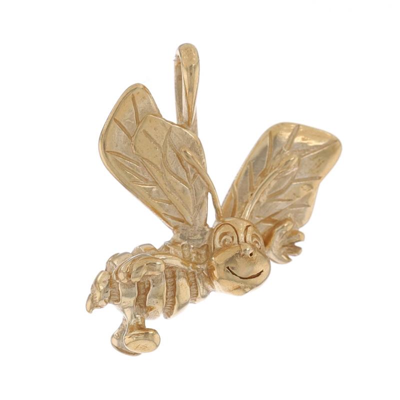 Metal Content: 14k Yellow Gold

Theme: Happy Bee, Insect
Features: Etched Detailing

Measurements

Tall (from stationary bail): 27/32