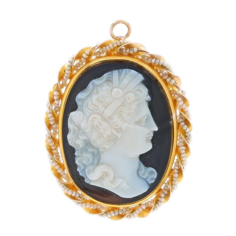 Era: Art Deco
Date: 1920s - 1930s

Metal Content: 14k Yellow Gold

Stone Information
Natural Hardstone Banded Agate
Cut: Carved Cameo
Color: Black & White
Size: 30.8mm x 23.5mm

Natural Pearls

Style: Convertible Brooch/Pendant
Fastening Type:
