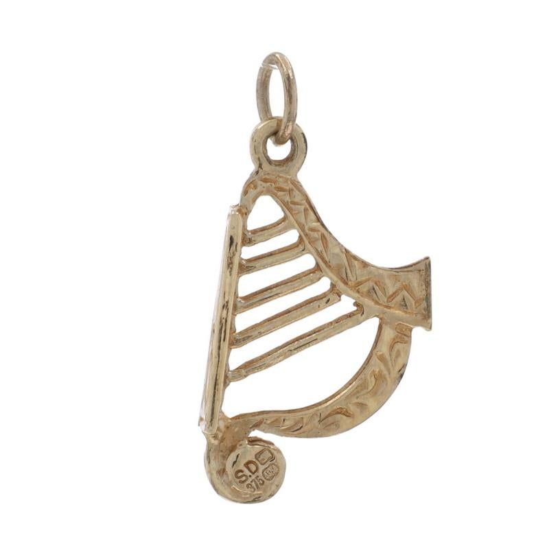 Metal Content: 9k Yellow Gold

Theme: Harp, Stringed Music Instrument
Features: Etched Detailing

Measurements

Tall (from stationary bail): 23/32
