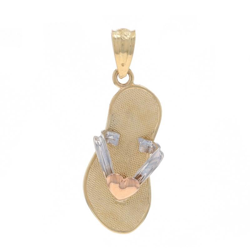 Brand: Michael Anthony

Metal Content: 14k Yellow Gold, 14k White Gold, & 14k Rose Gold

Theme: Heart Flip-Flop, Summer Footwear
Features: Smoothly Finished with Textured Detailing

Measurements

Tall (from stationary bail): 25/32