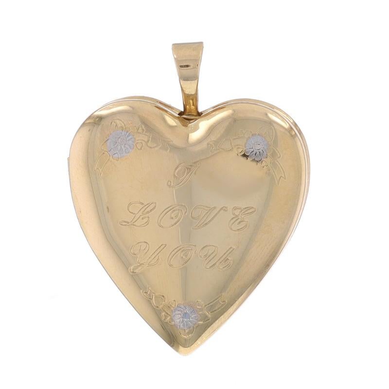 Metal Content: 14k Yellow Gold & 14k White Gold

Style: Locket
Theme: Heart, Love
Features: Etched Detailing on Front with Two Photo Frames Inside

Measurements

Tall (from stationary bail): 1