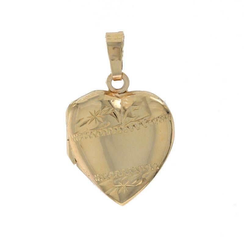 Metal Content: 14k Yellow Gold

Style: Locket
Theme: Heart, Love
Features: Etched Detailing & Two Photo Frames

Measurements

Tall (from stationary bail): 21/32