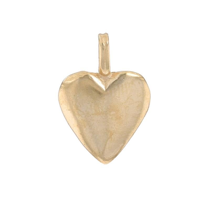 Metal Content: 14k Yellow Gold

Theme: Heart, Love Gift
Features: Matte Finish

Measurements

Tall (from stationary bail): 5/8