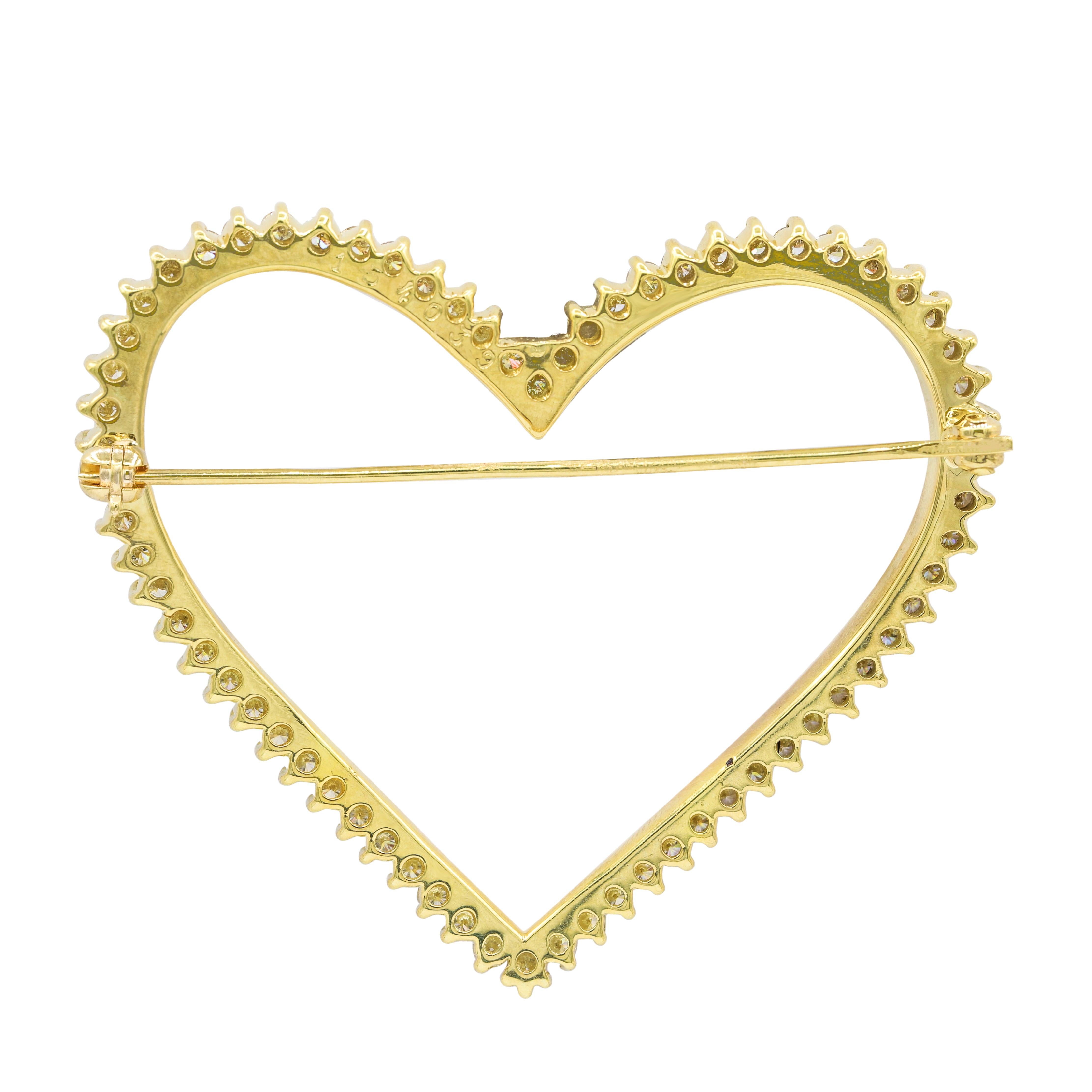 Elegant 14KT yellow gold heart shape brooch features 3.00 cts of diamonds G-H color, VS clarity