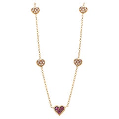 Yellow Gold Heart Shaped Ruby and Four Diamond Heart Charm Pendant