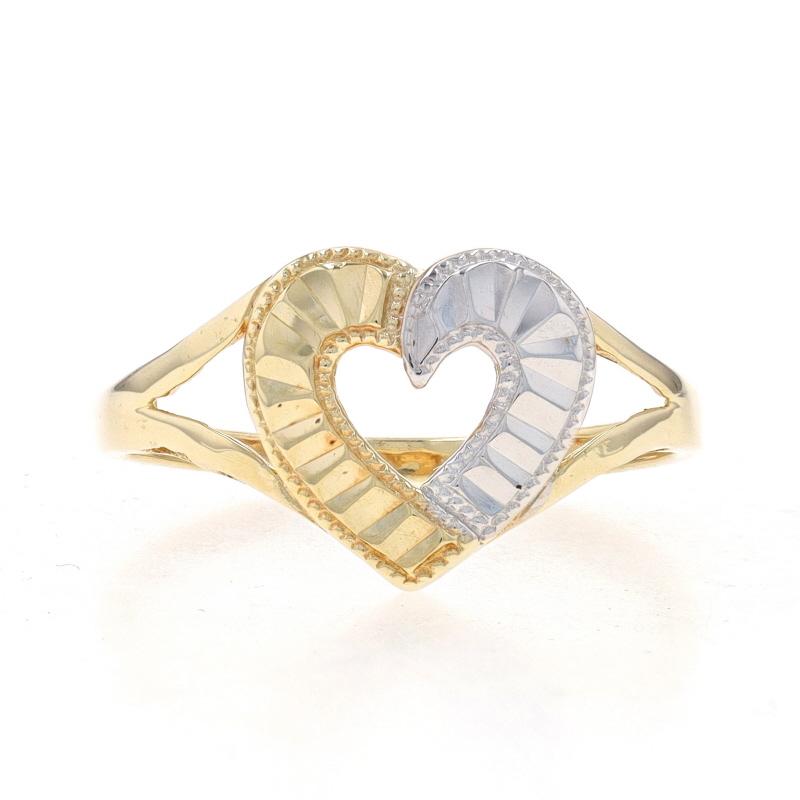 Size: 7
Sizing Fee: Up 2 sizes for $35 or Down 2 sizes for $30

Metal Content: 10k Yellow Gold & 10k White Gold

Style: Statement
Theme: Heart, Love
Features: Etched Milgrain Detailing

Measurements
Face Height (north to south): 7/16