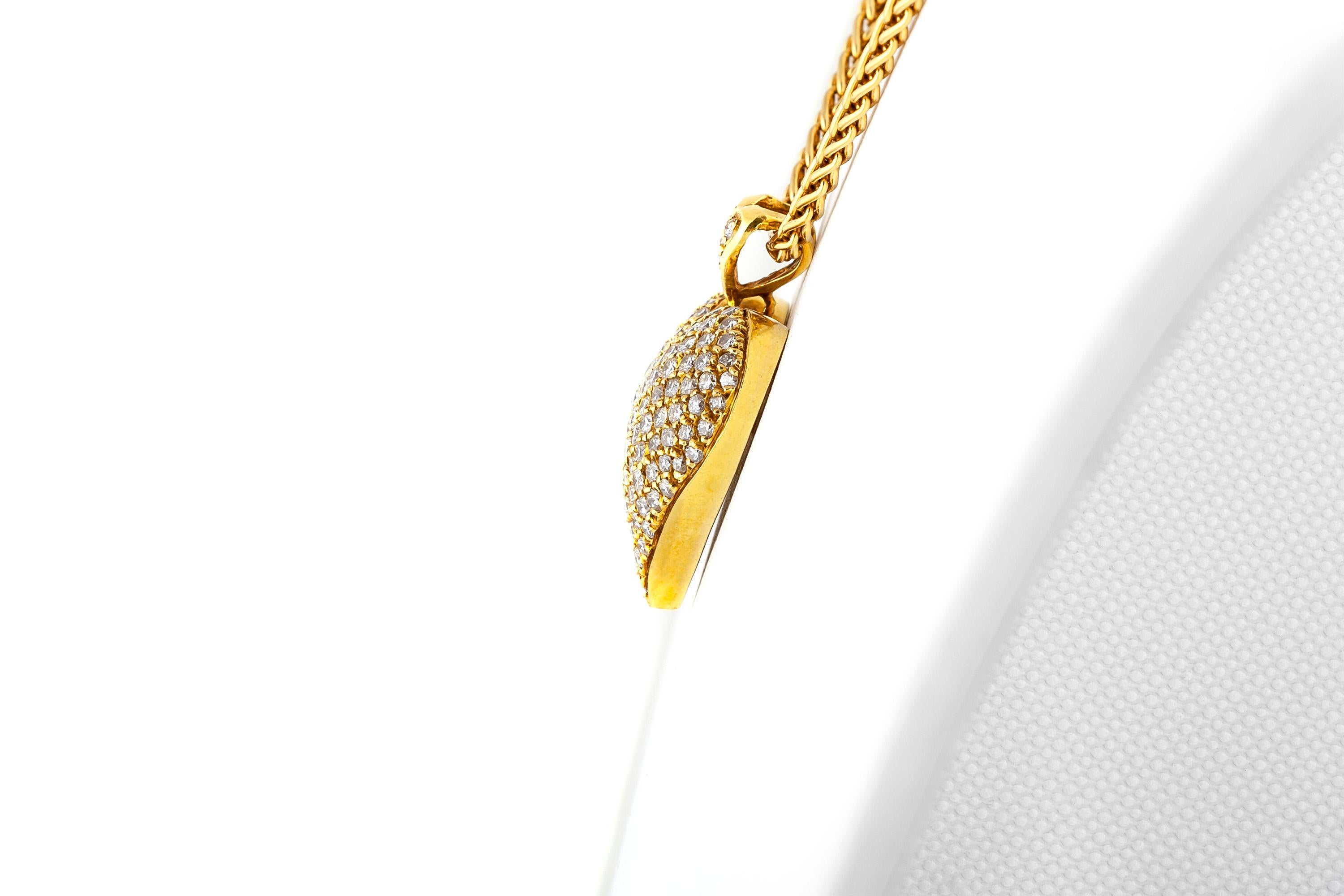 Finely crafted in 18k yellow gold with brilliant cut diamonds weighing a total of approximately 3.50 carats.