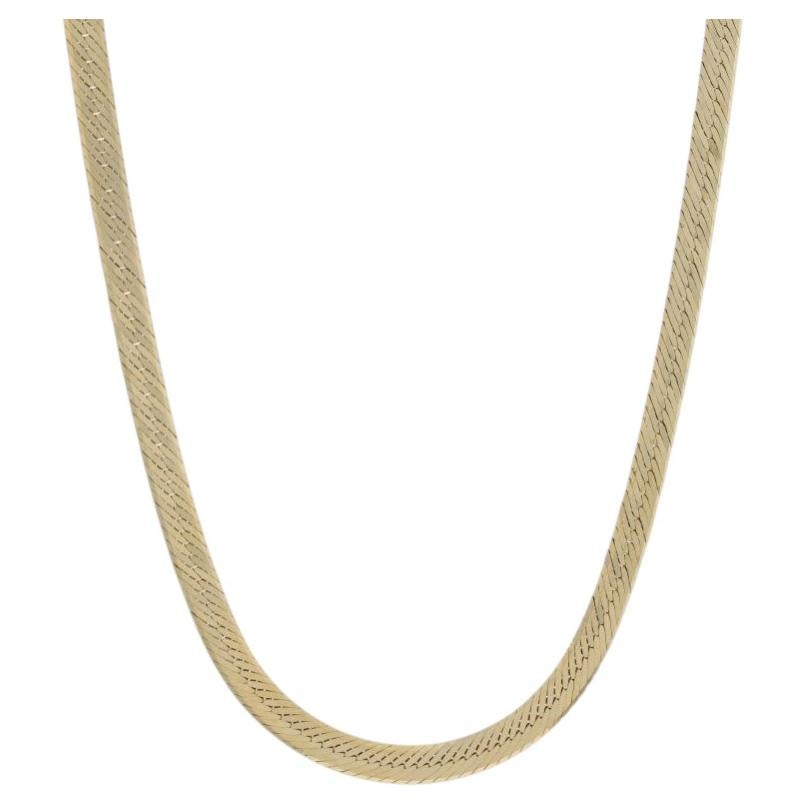 How is a herringbone chain made?