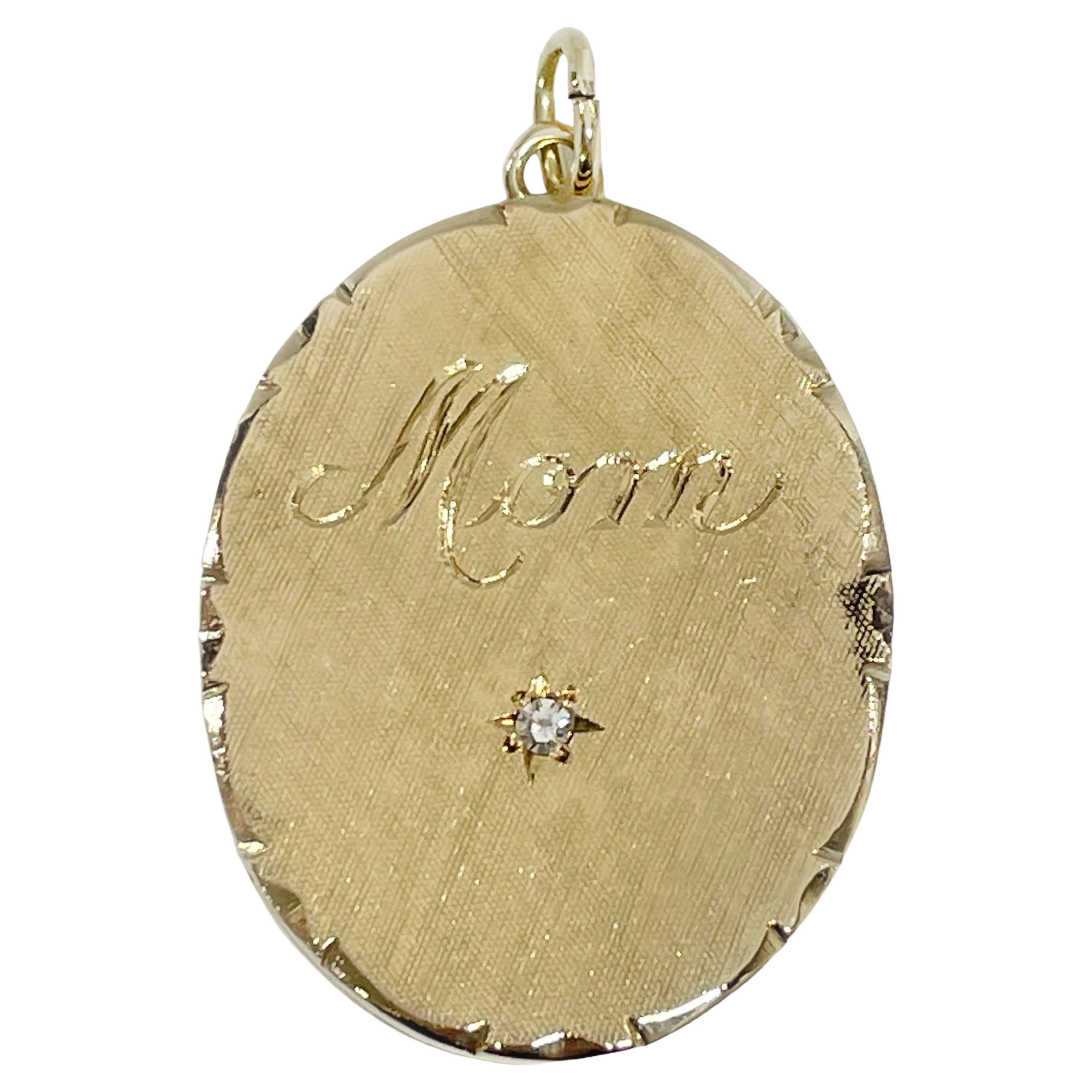 Pendentif médaillon en or jaune avec diamant et charnière