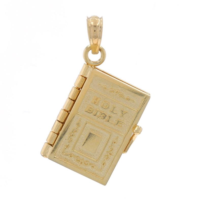 Contenuto del metallo: Oro giallo 14k

Tema: Sacra Bibbia, Il Padre Nostro
Caratteristiche: Il ciondolo si apre e rivela il Padre Nostro all'interno.

Misure

Altezza (dalla cauzione fissa): 7/8