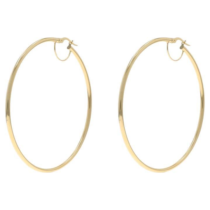 Boucles d'oreilles en or jaune 14k percées