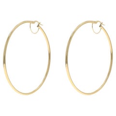Boucles d'oreilles en or jaune 14k percées