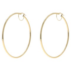 Orecchini a cerchio in oro giallo 14k con foro